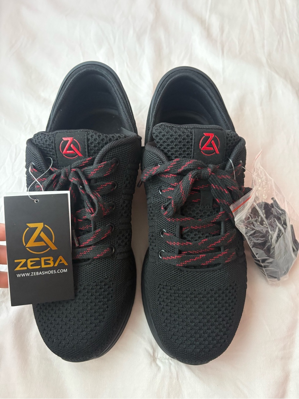 Zeba Men's Black Athletic Shoes with Red Accents